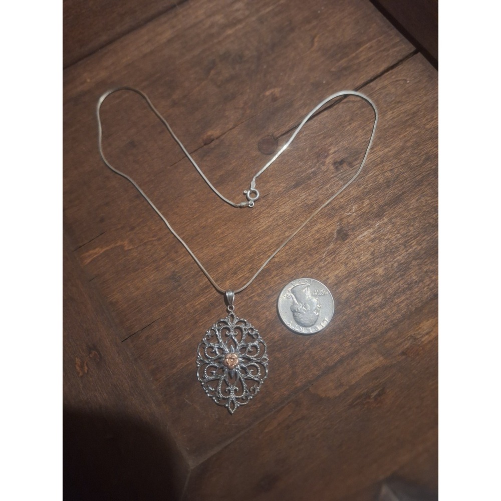 Beautiful sterling silver with 10K Rose pendant with 18" chain